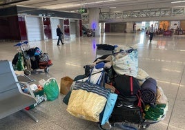 Trolleys of the homeless people who sleep at Malaga Airport.