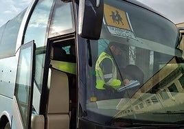 File image of the Guardia Civil carrying out a control on a school bus.