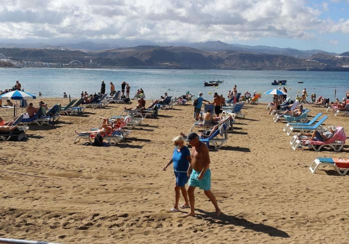 Tourists on the beach.