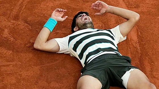 Carlos Alcaraz produces breathtaking comeback to triumph at Roland Garros
