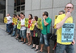 Protesting customers affected by mortgage floor clauses.