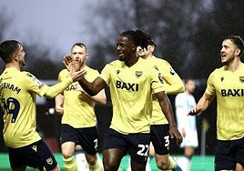 Oxford's Greg Leigh celebrates scoring on the final day of last season.