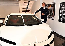 CEO Stephan Winkelmann, with one of the cars.