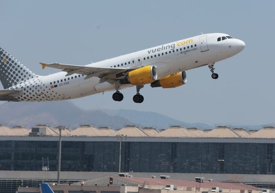 Vueling plane takes off from Malaga Airport.