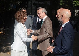 Montero and De la Torre greet each other outside the UMA.