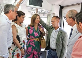 Salado, Del Cid, Navarro, Lara and De la Torre aboard a Cercanías train.