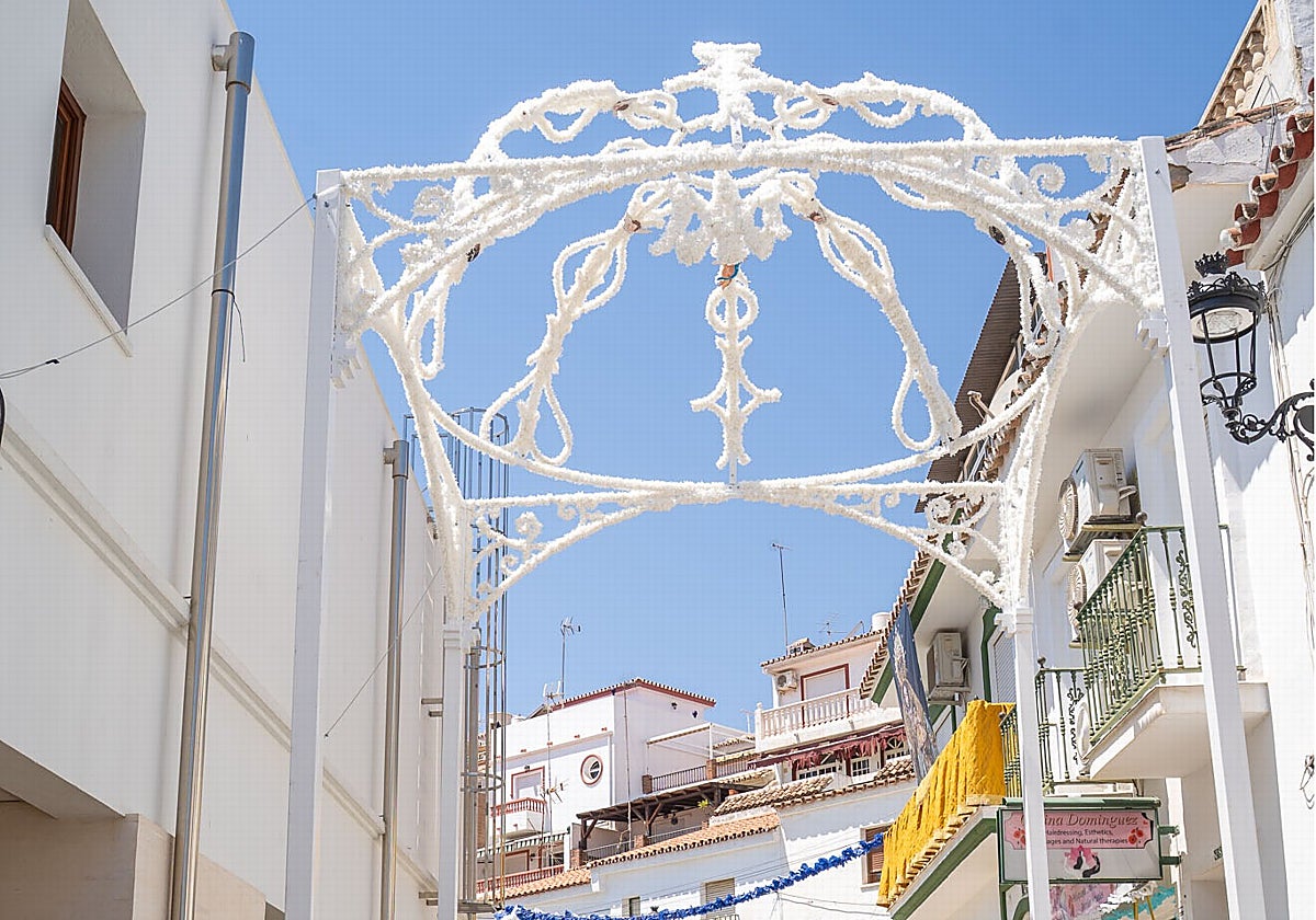 The town's patron will pass under the new structure during the procession.