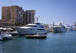 Three of the four large yachts that have arrived at the port for the start of the fair.