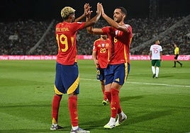 Lamine Yamal and Mikel Merino celebrate one of the goals.