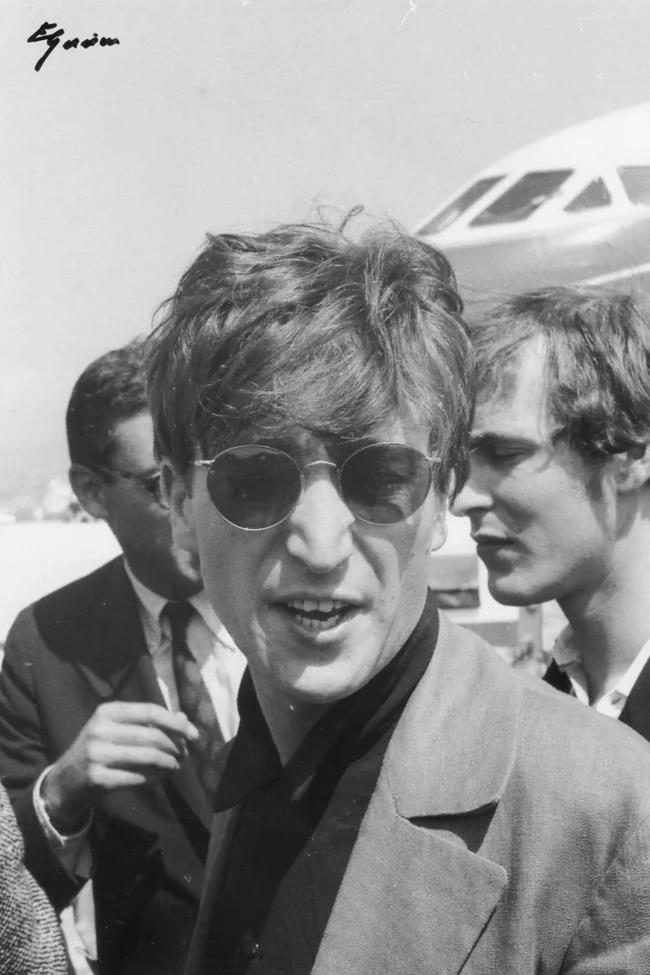 John Lennon, in the 1960s, at Malaga Airport.