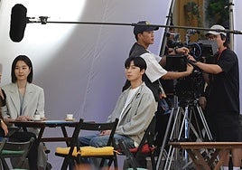 Park Seo-Joon (centre) and Won Ji-An, at the restaurant Alcazabilla vegetarian restaurant during the recent shoot.