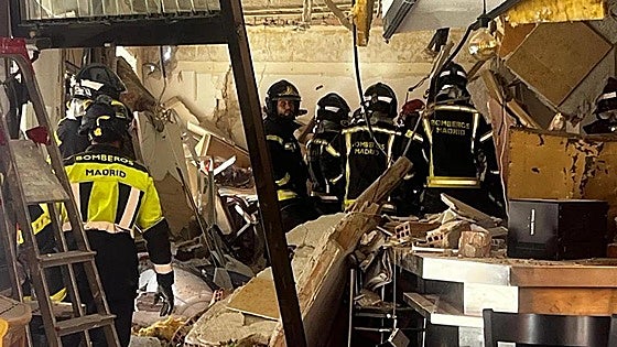 Firefighters find body of man buried under the rubble after bar explosion in Madrid