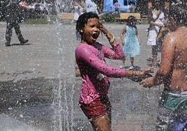 A girl cools off during a heatwave.