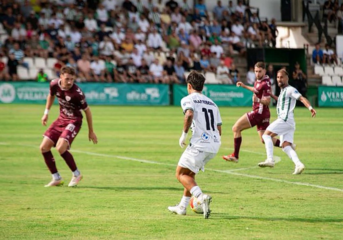 Iban Ribeiro progresses with the ball for Torremolinos.