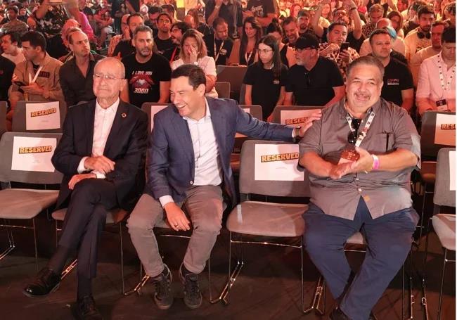 Malaga mayor Francisco de la Torre (left), Juanma Moreno (centre) and David Glanzer, before Schwarzenegger's talk.