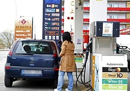 A customer refuels her car.