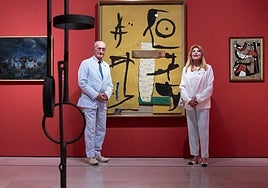 The mayor of Malaga and the baroness, next to a painting by Miró and a sculpture by Chillida.