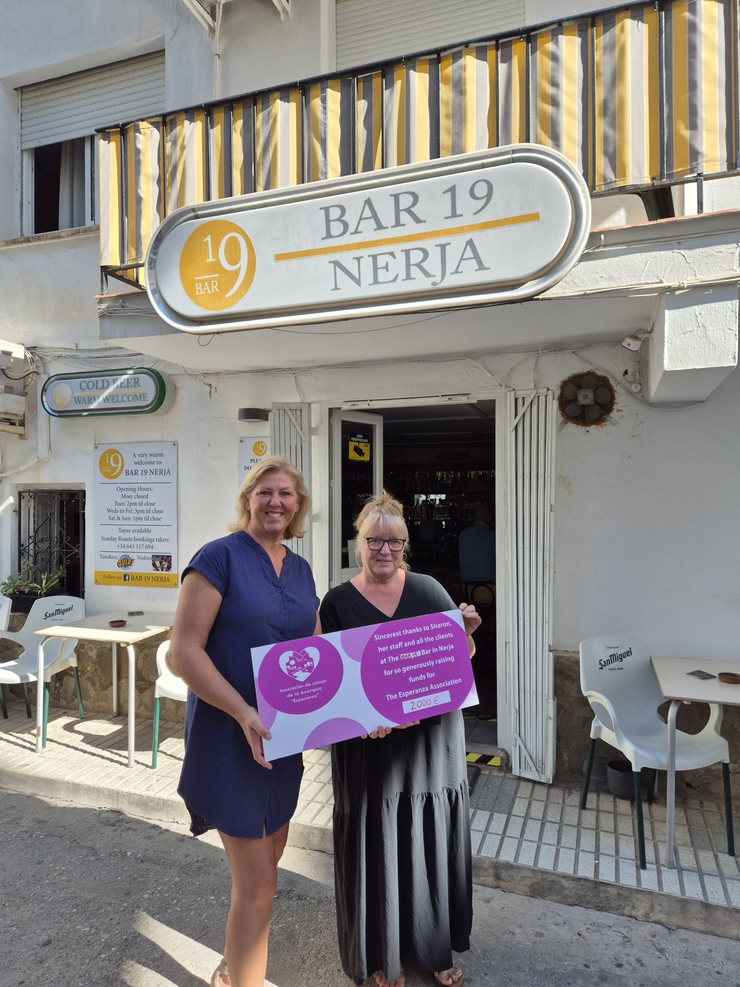 Erica and Sharon with the placard.