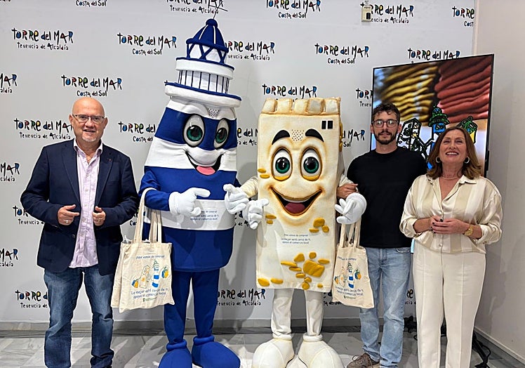 Councillors with the two mascots.