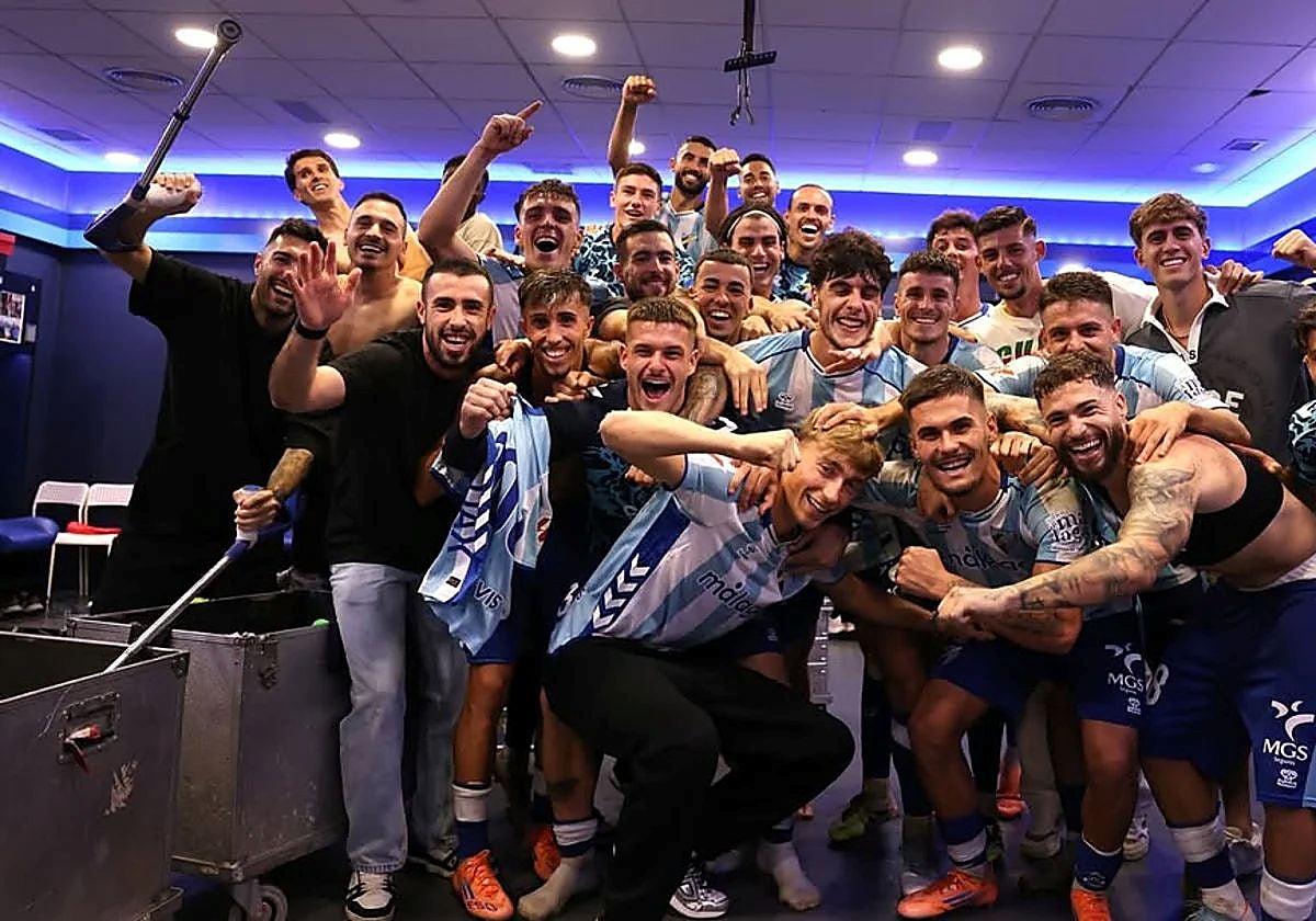 Huijsen, front and centre, in the changing room on Sunday night.