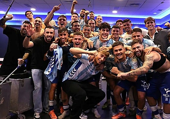 Huijsen, front and centre, in the changing room on Sunday night.