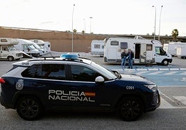 National Police officers at the parking area where the shooting incident happened.