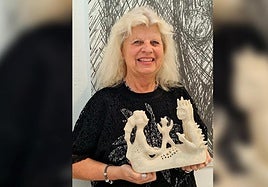 Sculptor Anette Skou with one of her pieces.