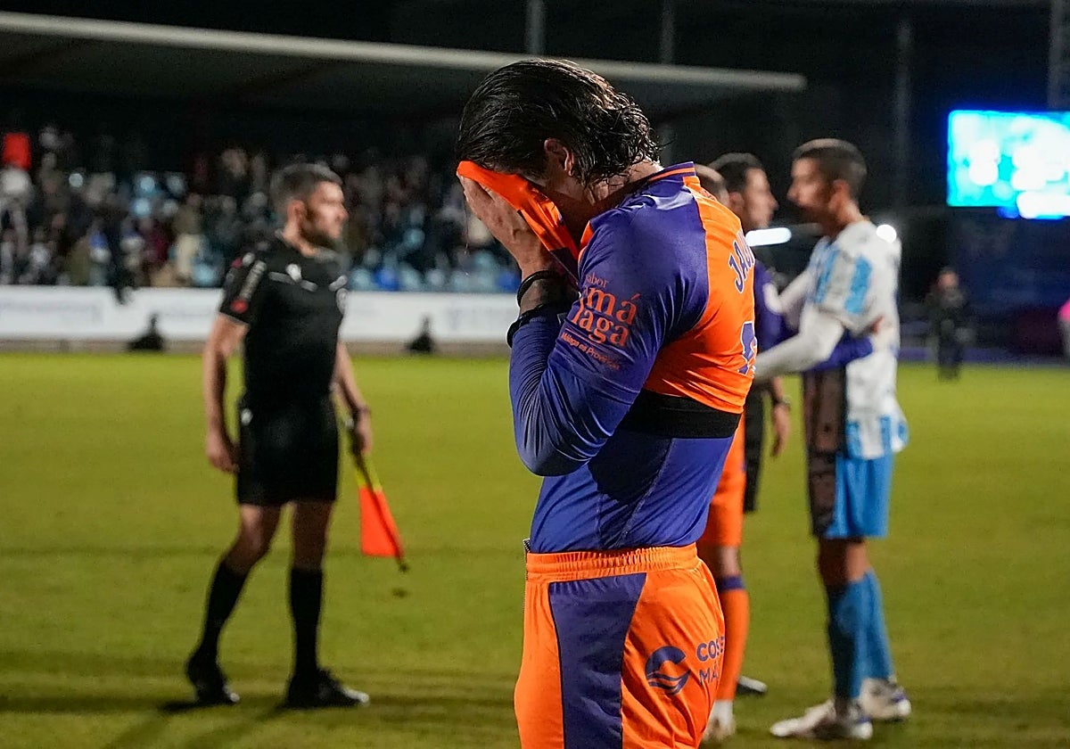 Malaga's Eneko Jauregi at the final whistle.