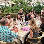 The chef prepared the menu among butterflies in front of the diners.