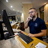 File photo of an employee receiving calls at the Hotel Salobreña.