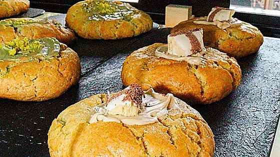 What are 'Marujitas' and where can you enjoy them in Malaga?