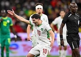 Brahim appeals for the penalty after being fouled in the box.