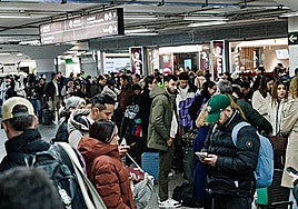 People waiting at Atocha station in Madrid.