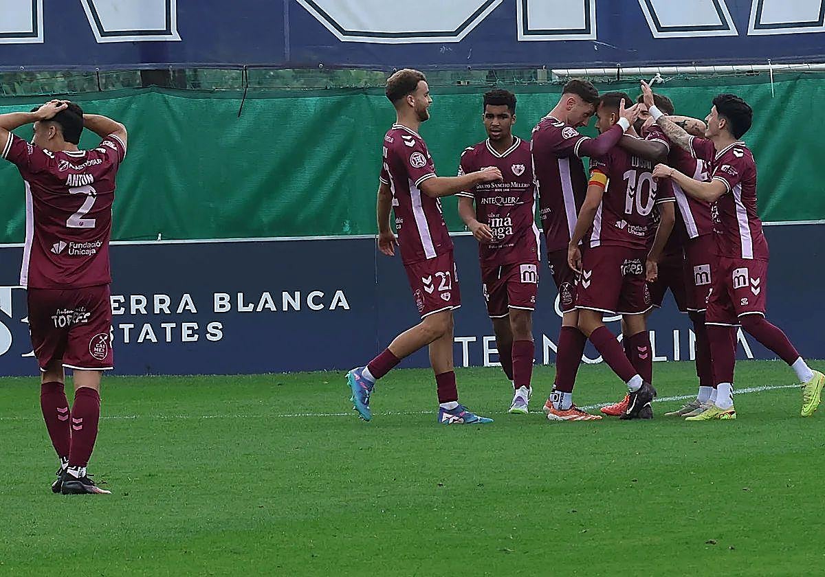 Antequera captain Luismi Gutiérrez is congratulated on scoring the only goal.