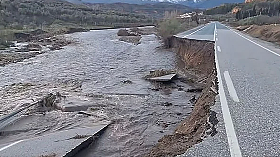 Granada road collapses into river seconds after family drives past