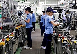 Workers in a factory in Malaga.