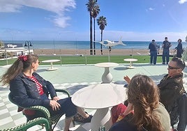 Rockers in the sun, on a terrace of the Pez Espada hotel, during a break in the Rockin' Race Jamboree.