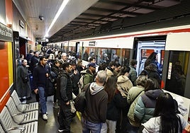Passengers crowding to board a Cercanías train at the María Zambrano station in Malaga.