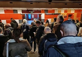 A crowd of passengers waiting for a train at the María Zambrano station in Malaga.