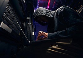 Archive image of your stereotypical hacker.