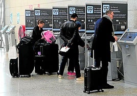 Passengers claiming VAT refunds at the machines at Malaga Airport.