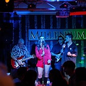 Steve Hughes (l) on stage with some of the performers at the fundraiser in Mijas.