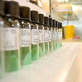 Image of a health worker handling MMR vaccines.