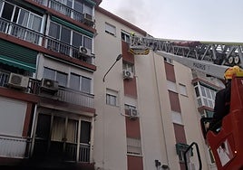 Malaga firefighters rescue inhabitants through windows after meter room catches fire