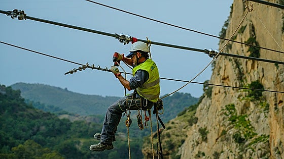Helicopters and zip lines used to build Spain's longest suspension bridge in Malaga