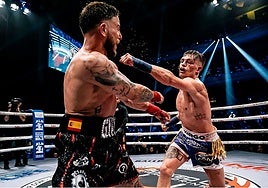 Kai Stewart lands a punch on Nico Gaffie in Miami on Friday.