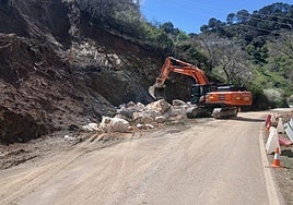 Working to clear landslides and clean up slopes on one of the storm-damaged roads in the Serranía de Ronda mountain range.