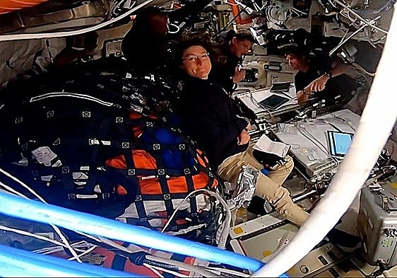 Orion's crew, with Christina Koch in the foreground, in Nasa's live broadcast.