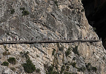 Archive photo of tourists walking along the Caminito del Rey route.