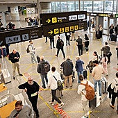 Passengers exiting Malaga Airport.